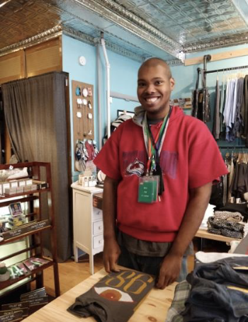 Client Chris C. learned on-the-job skills at a local clothing shop.